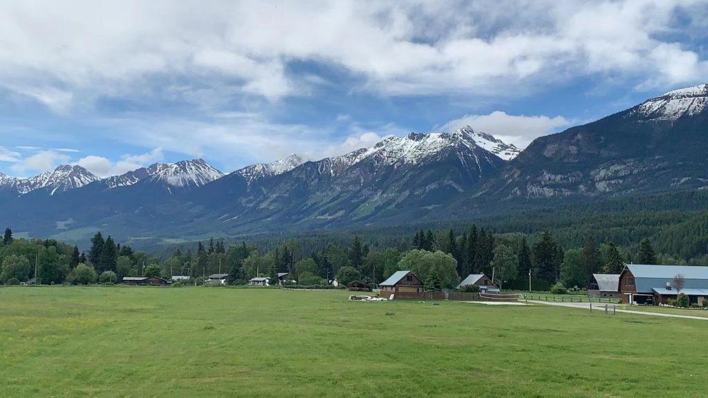 Full-hookup RV camping area below the mountains