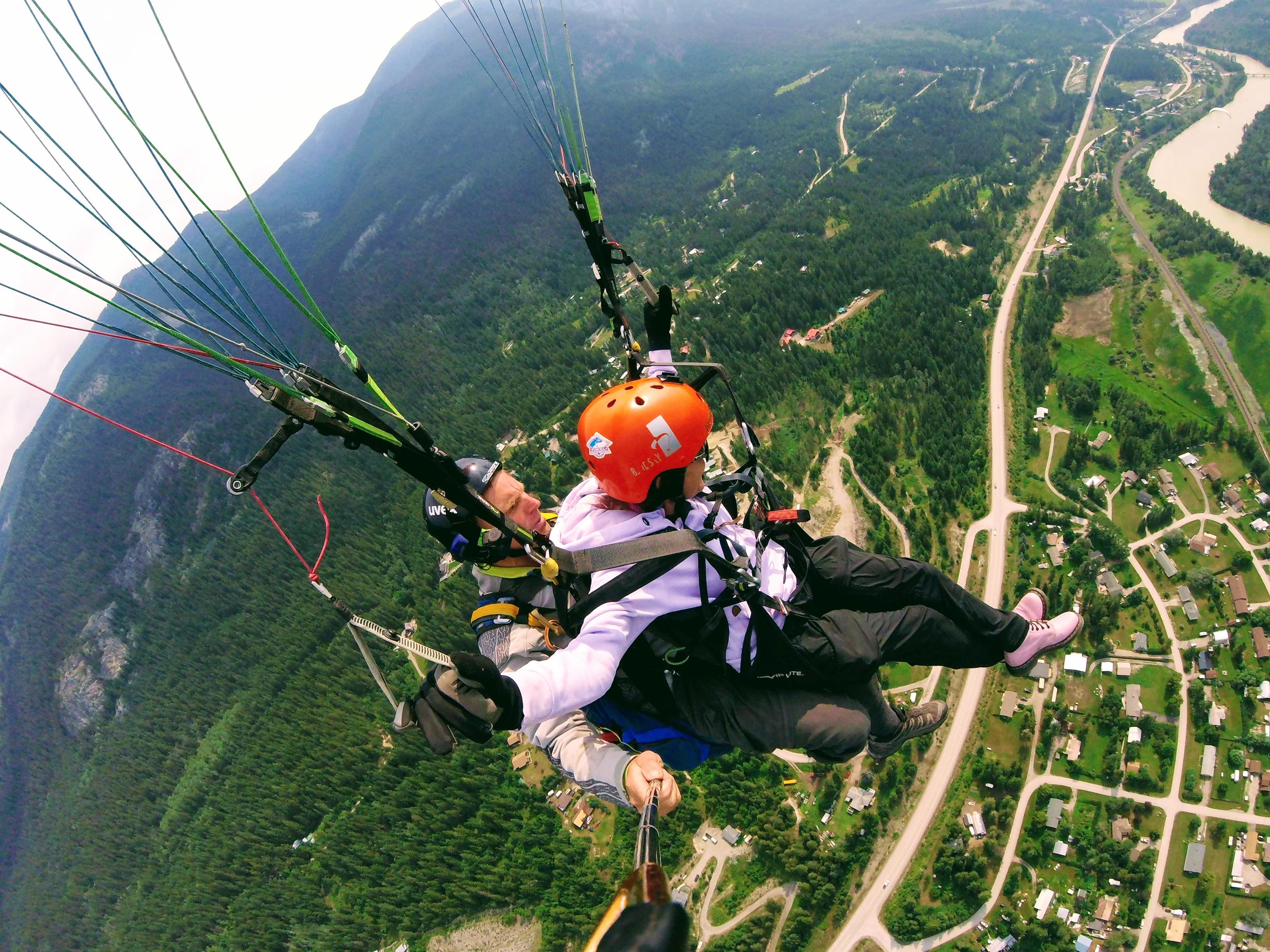 Tandem paragliders above the Columbia Valley near Golden, British Columbia