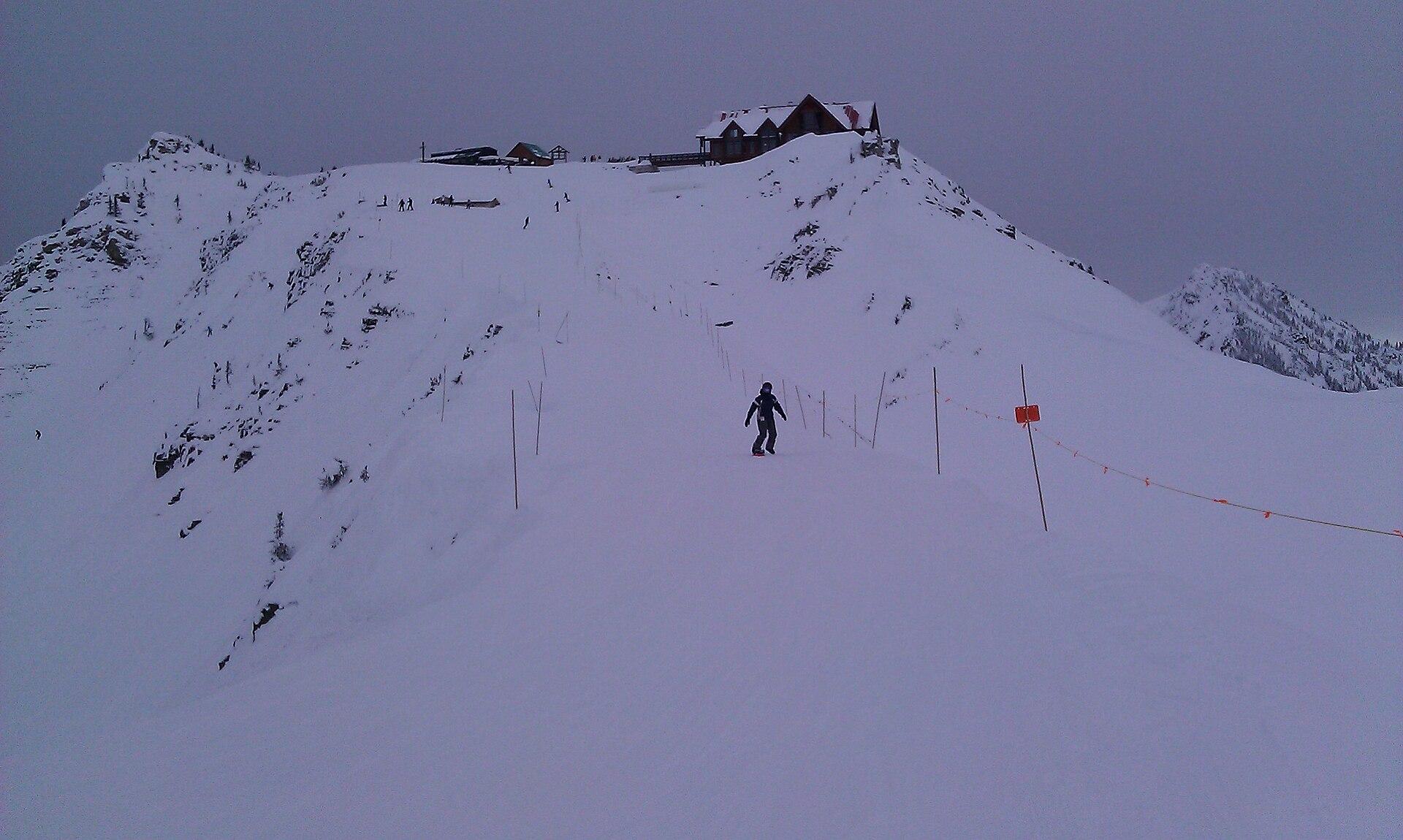Skier on It's a Ten run at Kicking Horse Mountain Resort above Golden, BC